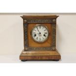 A MODERN MAHOGANY CASED MANTEL CLOCK