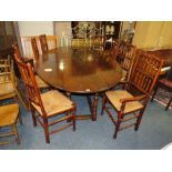 A LARGE AND IMPRESSIVE OAK WAKE TABLE, H 76 CM, DIA. 258 CM, TOGETHER WITH A SET OF EIGHT WICKERSEAT