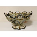 A 19TH CENTURY TIN GLAZED DECORATIVE ITALIAN BOWL MARKED MOLARONI PESARO, W 31 CM