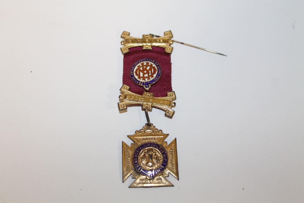 A SILVER GILT R.A.O.B JEWEL