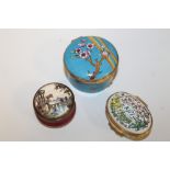 A HALCYON DAYS ENAMEL METROPOLITAN OPERA HOUSE PILL BOX, TOGETHER WITH TOW BILSTON ENAMEL PILL BOXES