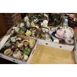 THREE TRAYS OF ASSORTED CERAMICS TO INCLUDE BESWICK CHARACTER TEA POTS, WADE DRESSAGE TEA POTS,