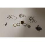 A COLLECTION OF SILVER AND COSTUME JEWELLERY TO INCLUDE AN ETERNITY RING, GEMSET SILVER LOCKET ETC.