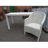 A MODERN CREAM WICKER STYLE GARDEN TABLE TOGETHER WITH A SINGLE MATCHING CHAIR