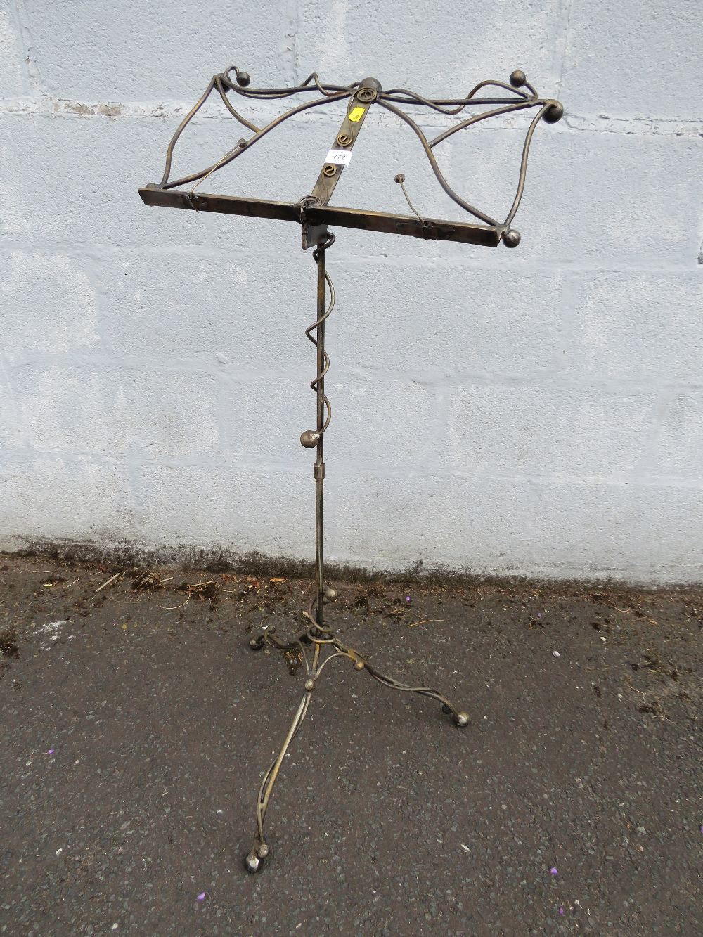 AN UNUSUAL METAL MUSIC STAND H-110 CM