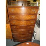 A REPRODUCTION WALNUT SERPENTINE FRONTED CHEST ON CHEST H-141 CM W-78 CM
