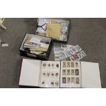 TWO ALBUMS OF VINTAGE CIGARETTE CARDS, TOGETHER WITH TWO BOXES OF LOOSE STAMPS, FIRST DAY COVERS AND