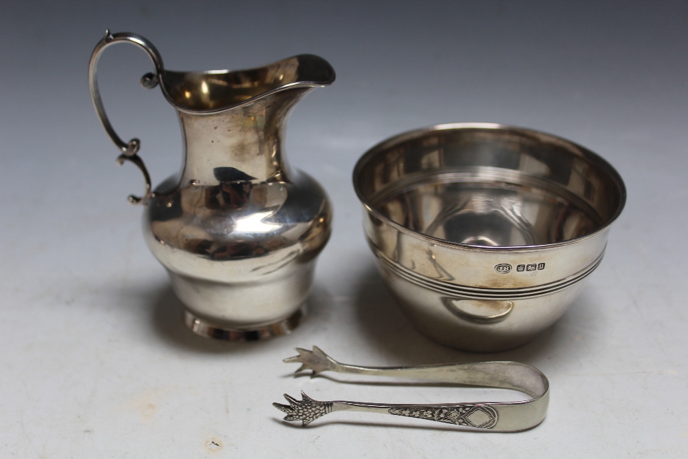 A HALLMARKED SILVER CREAM JUG - BIRMINGHAM 1901, approx weight 78g, H 10cm, together with a