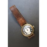 A BRASS MILITARY TYPE WRIST WATCH, Dia 3.5 cm Condition Report:ticks on winding - working capacity