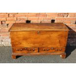 A 19TH CENTURY MULE CHEST, with traditional hinged lid raised on bracket feet, H 67 cm, W 115 cm