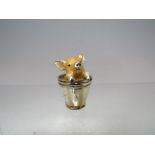 A MINIATURE SILVER AND ENAMEL PAINTED PIGLET IN A BUCKET, marks to base, H 3.5 cm