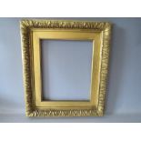 A 19TH CENTURY DECORATIVE GOLD FRAME WITH GOLD SLIP, frame W 4.5 cm, slip rebate 30 x 25 cm, frame