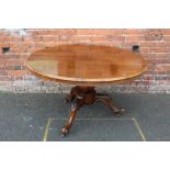 A 19TH CENTURY ROSEWOOD TILT-TOP TABLE, the circular top with original mechanism, supported on an