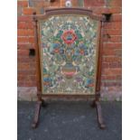 A LARGE EDWARDIAN MAHOGANY FRAMED FIRE SCREEN, with carved detail and inset William Morris pattern