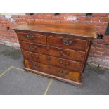 A 19TH CENTURY MAHOGANY AND WALNUT CHEST OF TWO SHORT AND THREE LONGER DRAWERS, crossbanded and