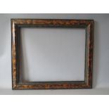 A LATE 19TH / EARLY 20TH CENTURY FAUX TORTOISESHELL FRAME, with egg and dart design to inner edge,