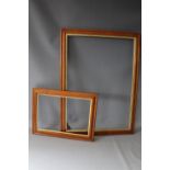 TWO 19TH CENTURY MAPLE FRAMES WITH GOLD SLIPS, frame W 4 cm & 3.5 cm, rebates 43 x 30 cm & 77 x 56