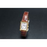 AN 18K DREFUSS & CO HAND MADE SWISS WRIST WATCH, engraved to the back Peries 1974 No278 18k, clasp