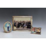 A 925 SILVER RECTANGULAR PHOTO FRAME, together with a smaller double section 800 example and a