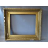 A 19TH CENTURY GOLD FRAME WITH GOLD SLIP, having acanthus leaf design to outer edge, frame W 7 cm,