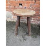 A LARGE RUSTIC FOUR LEG STOOL, H 58 cm