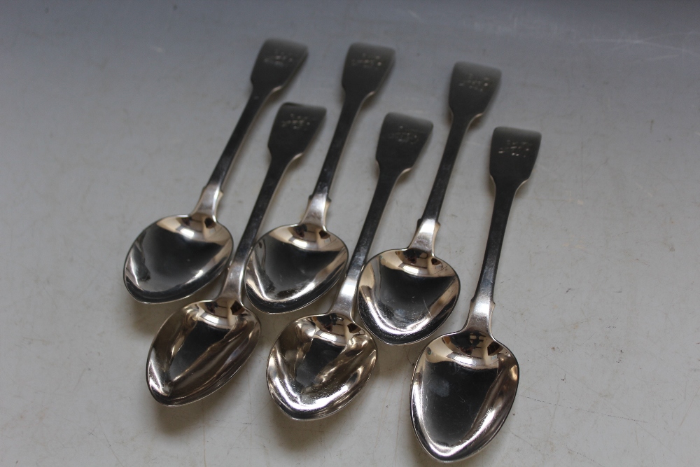 A MATCHED SET OF SIX HALLMARKED FIDDLE PATTERN SILVER TABLE SPOONS, all having makers mark JH,