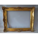 A 20TH CENTURY GOLD SWEPT FRAME, frame W 8 cm, rebate 61 x 46 cm