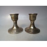 A PAIR OF HALLMARKED SILVER SQUAT CANDLESTICKS - BIRMINGHAM 1961, makers mark for S&M, base Dia. 7.3