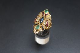 A MUTLI STONE GEM SET RING, set with diamonds, emeralds, rubies and sapphires, stamped 750, approx