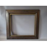 A 19TH CENTURY DUTCH FRAME WITH GOLD SLIP, frame W 9 cm, slip rebate 53 x 46 cm, frame rebate 55 x