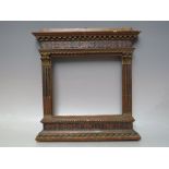 A 19TH CENTURY GRAND TOUR STYLE FRAME, with Corinthian columns to side, frame side W 3 cm, frame top