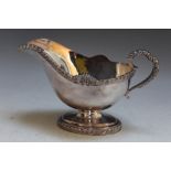 A HEAVY HALLMARKED SILVER SAUCE BOAT - SHEFFIELD 1988, approx weight 337g, W 18 cm