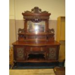 A 19TH CENTURY LARGE OAK AND WALNUT MIRROR BACKED SIDEBOARD, having carved decoration throughout