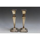 A PAIR OF HALLMARKED SILVER CANDLESTICKS - BIRMINGHAM 1916, filled bases, H 15 cm Condition Report: