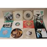 A COLLECTION OF 45RPM 7" SINGLE RECORDS ON COLOURED VINYL ETC., to include Squeeze, The Wild Ones,