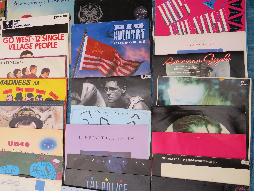 A COLLECTION OF MOSTLY 12" SINGLE RECORDS, various years of issue, artists include Madonna, Madness - Image 9 of 10