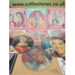 A COLLECTION OF NINE ELVIS PRESLEY PICTURE DISCS, together with an Elvis Presley and Bill Haley Dan