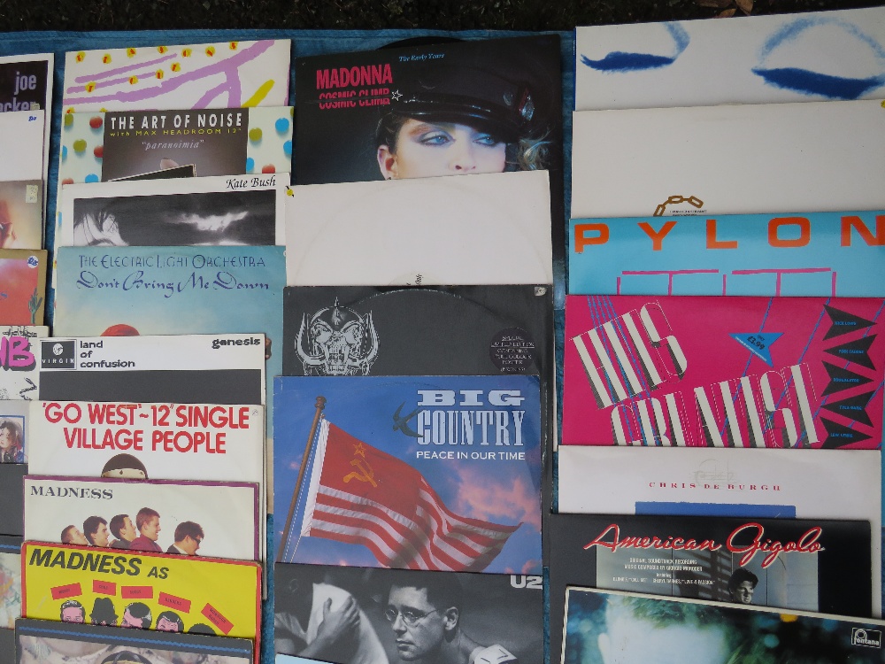 A COLLECTION OF MOSTLY 12" SINGLE RECORDS, various years of issue, artists include Madonna, Madness - Image 8 of 10