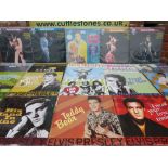 A COLLECTION OF ELEVEN ELVIS PRESLEY LP RECORDS BY DOM DISQUES, together with a selection of 12" ma