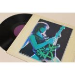 A LIVE VINYL OF VAN HALEN BUDOKAN JAPAN 1979 TOUR, blank purple inner labelCondition