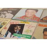 A COLLECTION OF ELVIS PRESLEY RELATED 45 RPM 7" SINGLES AND EPS ETC., to include a Spanish compact