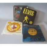 TWO BOXED COLLECTORS SETS OF ELVIS PRESLEY SUN SINGLES, together with a boxed Elvis record coasters