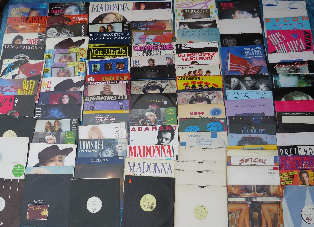 A COLLECTION OF MOSTLY 12" SINGLE RECORDS, various years of issue, artists include Madonna, Madness