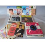 A COLLECTION OF ELVIS PRESLEY 7" SINGLE RECORDS, to include a selection of RCA collector's series l