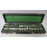 A SILVER PLATED FLUTE BY F. BUISSON