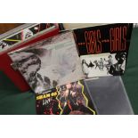 TWO CASES OF MOSTLY STIFF LP RECORDS AND SINGLES TO INCLUDE PROMOTIONAL COPIES, including Graham Pa