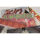 FOUR ASSORTED LP RECORDS comprising of Lunachicks Babysitters On Acid, Zappa In New York, The Tubes