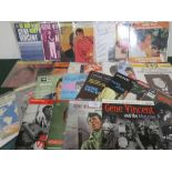 A COLLECTION OF VINTAGE AND MODERN GENE VINCENT IMPORT EP RECORDS, various record labels and dates