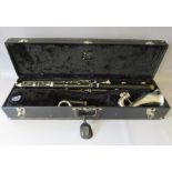 A LARGE SELMER BASS CLARINET WITH CASE, having chrome plated keys, swan neck and bell, two mouthpie
