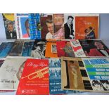 A COLLECTION OF VINTAGE 7" AND EP RECORDS, to include a selection of TV and film theme music, Chris